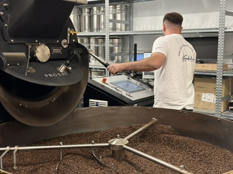 Freshly roasted coffee cooling at Kávoholik in Bratislava